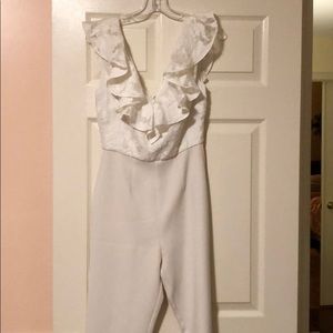White jumpsuit with ruffle lace v-neck